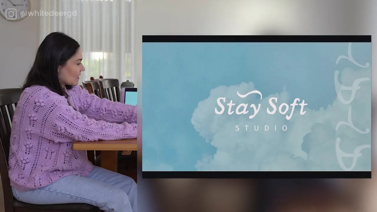 Blue cloud background with Stay Soft logo on a presentation screen